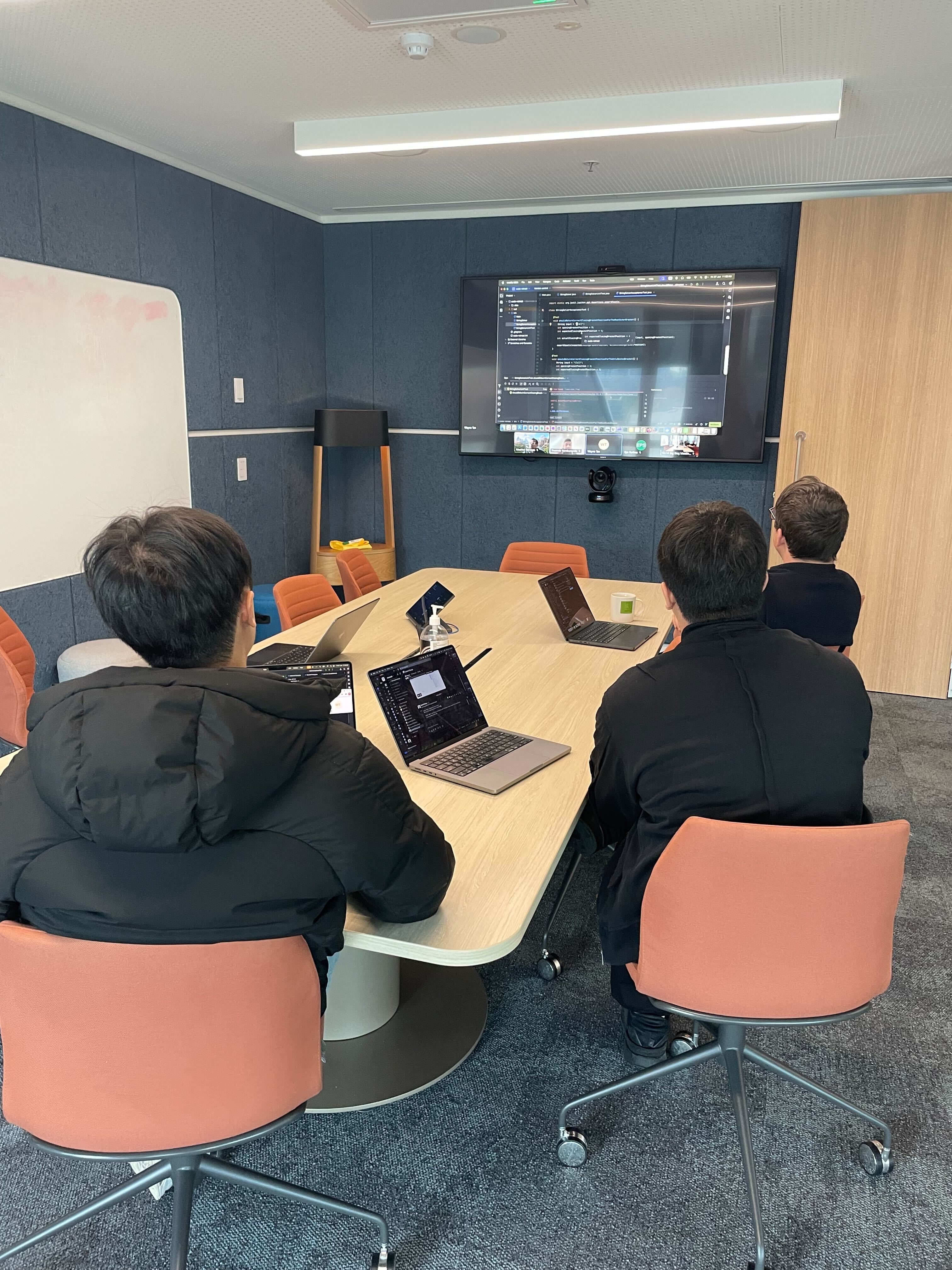 Team collaborating during code retreat